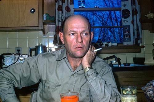 LV Steinhoff smokes at kitchen table March 1961