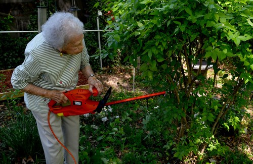 Mary Steinhoff with hedge trimmer for Mother's Day