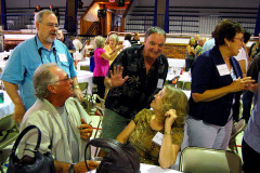 Bill East, left, and Terry Hopkins, center, at 2010 Central High School reunion
