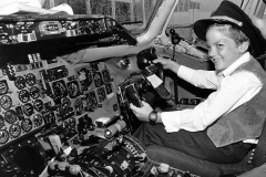 Adam Steinhoff in cockpit of jet at Palm Beach International Airport for newspaper illusteration