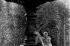 Children playing in Cape Girardeau Civil War Statue fountain