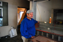 Owner John Buckner in Esquire Theater before renovation 10-18-2011