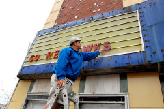 Owner John Buckner in Esquire Theater before renovation 10-18-2011