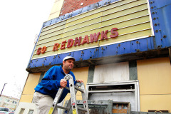 Owner John Buckner in Esquire Theater before renovation 10-18-2011