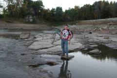 Mark Steinhoff climbs Tower Rock with bicycle 10-12-2003