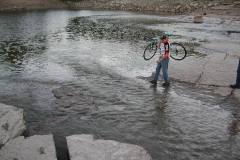 Mark Steinhoff climbs Tower Rock with bicycle 10-12-2003