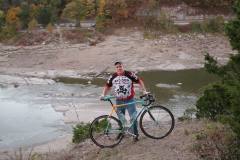 Mark Steinhoff climbs Tower Rock with bicycle 10-12-2003