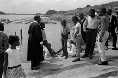 Log-raft-in-background-of-New-Mardrid-Mississippi-River-Baptism-c-1967-100