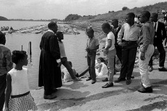 Log-raft-in-background-of-New-Mardrid-Mississippi-River-Baptism-c-1967-100