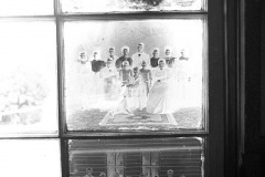 Glass negatives used as window panes in building at Frohna Saxon Memorial c 1966