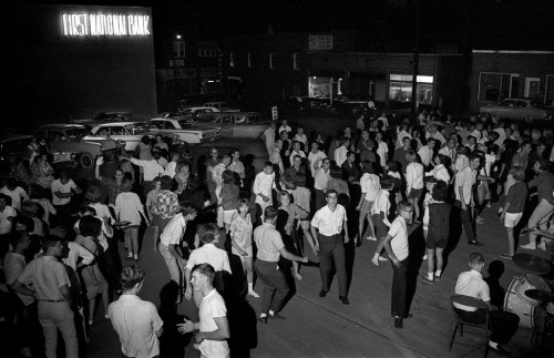 Teen Age Club dance overflowed to 1st National Bank parking lot c 1965