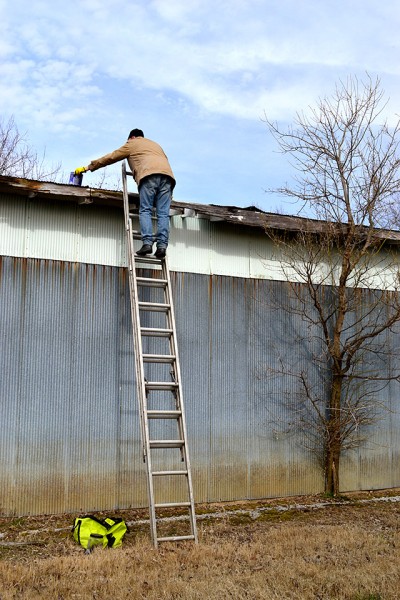 Mark Steinhoff repairing roof at Dutchtown 02-09-2013