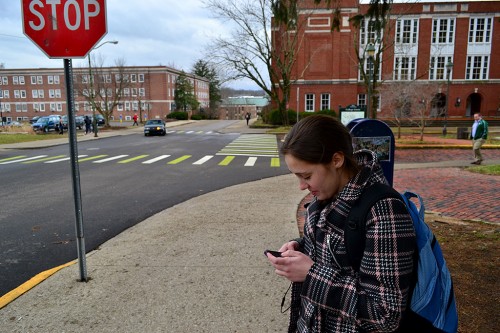 Girl texting across from Scott Quad - OU - Athens 02-27-2013