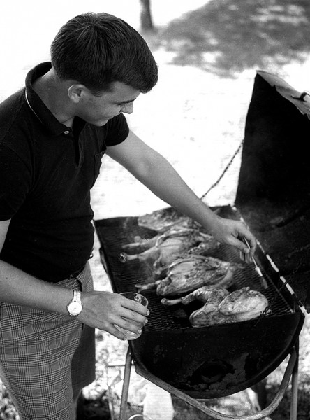 Tom Holt grilling chicken c 1965