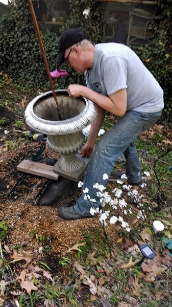 Mark repairs fountain 04-26-2014