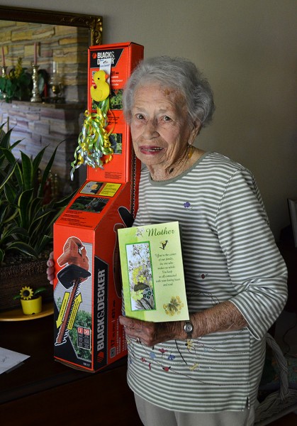 Mary Steinhoff with hedge trimmer for Mother's Day